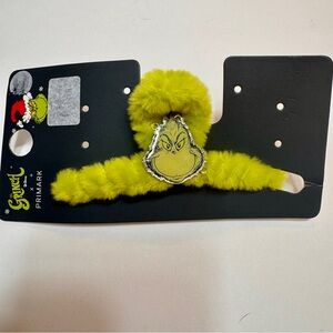 NWT. Grinch fuzzy hair claw clip, part of the popular Grinch-themed hair clip